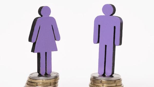 man-woman-standing-equal-piles-coins_23-2148419716