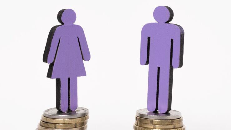 man-woman-standing-equal-piles-coins_23-2148419716