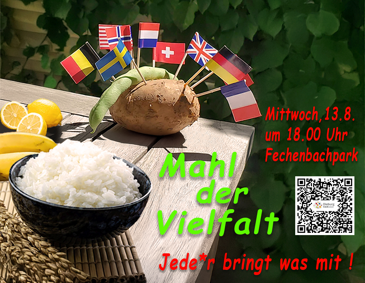 Ein Tisch mit einer Schüssel Reis, Getreide, Obst und einer mit Landesfahnen gespickte Kartoffel