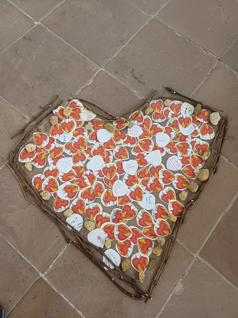 In Herzform gebrachte Sticker