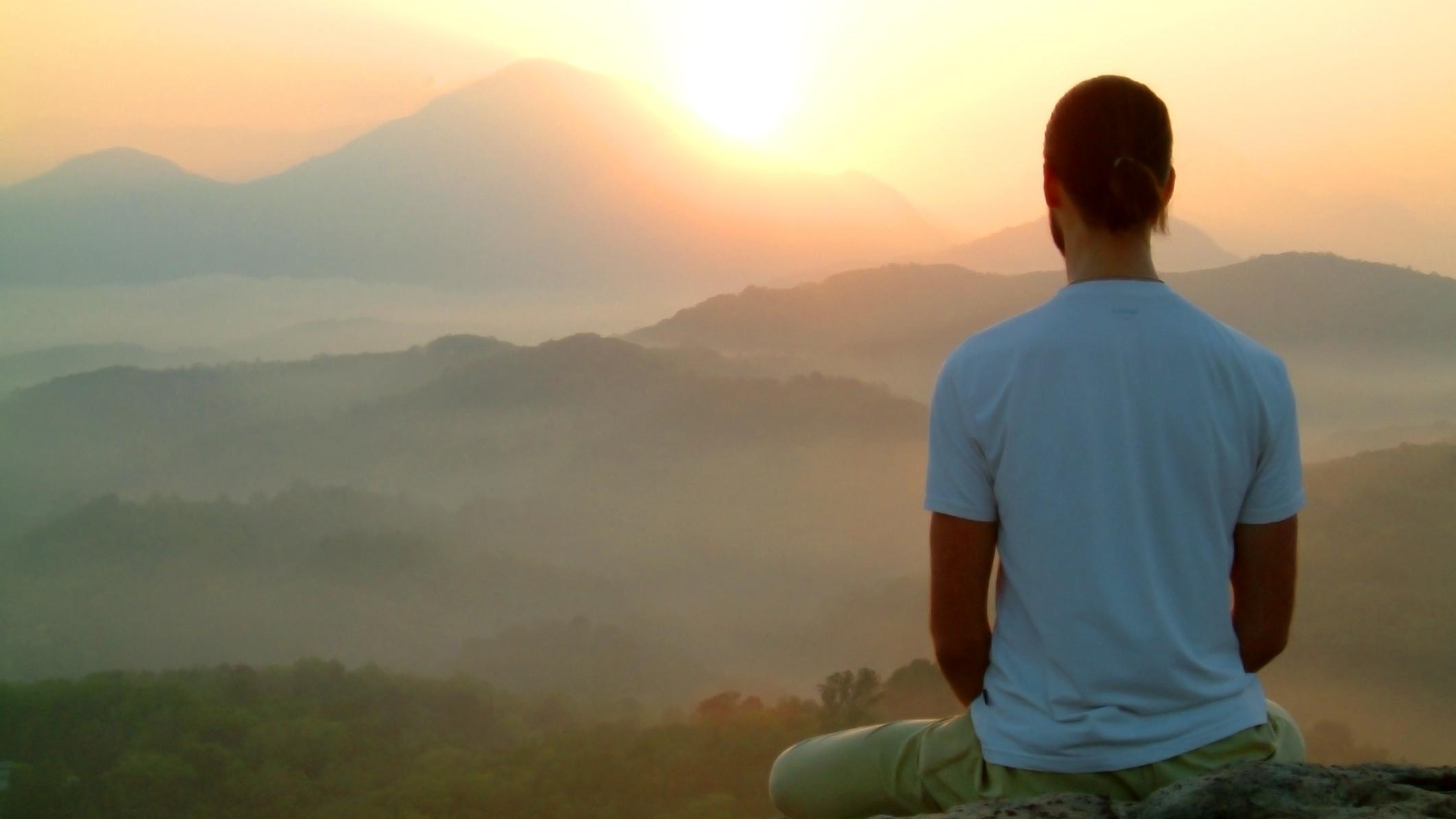 man sunrise meditatiion