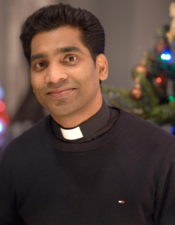 Das Portrait von Pfarrvikar Ajimon Joseph
