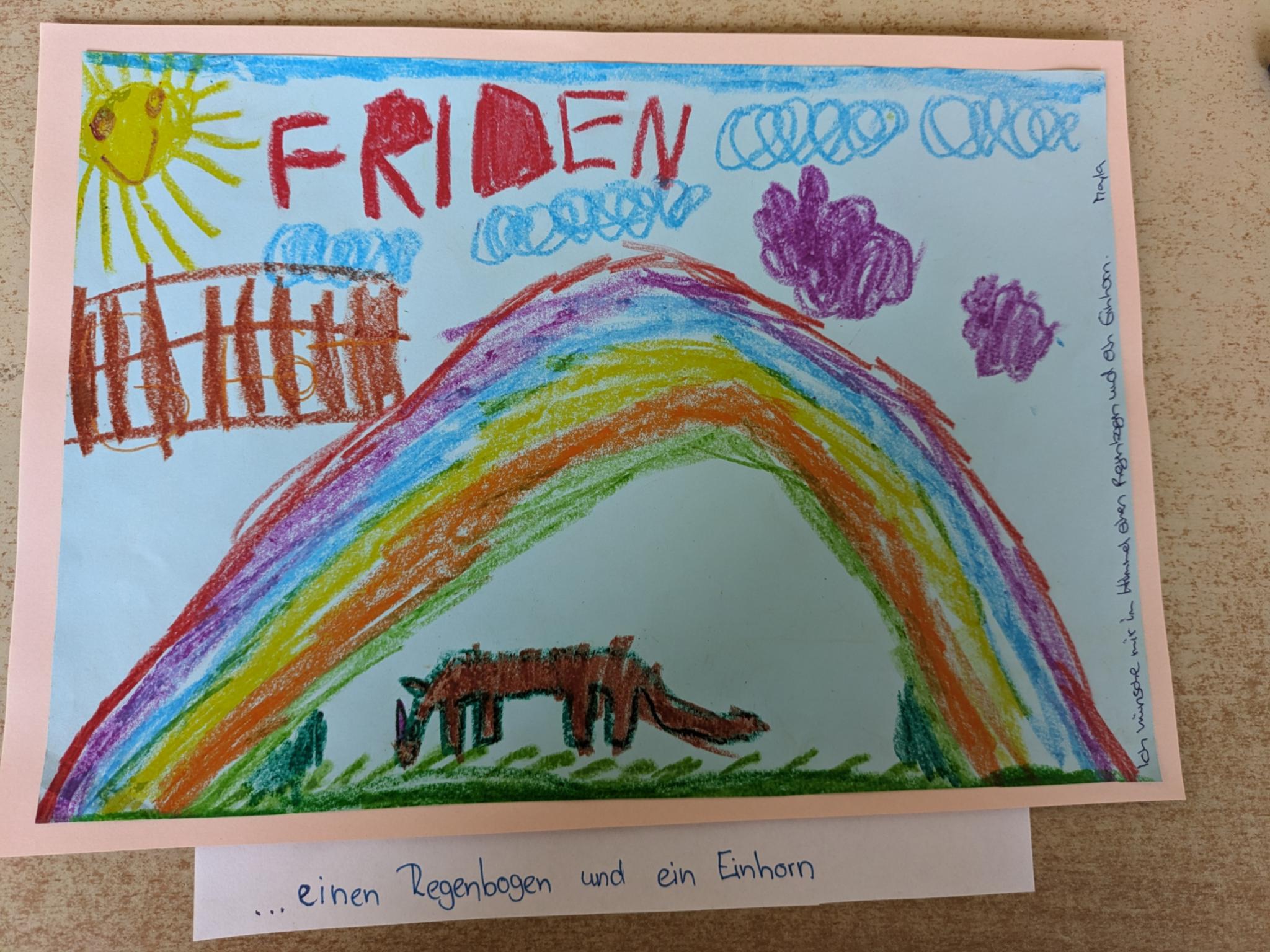 einen Regenbogen und ein Einhorn